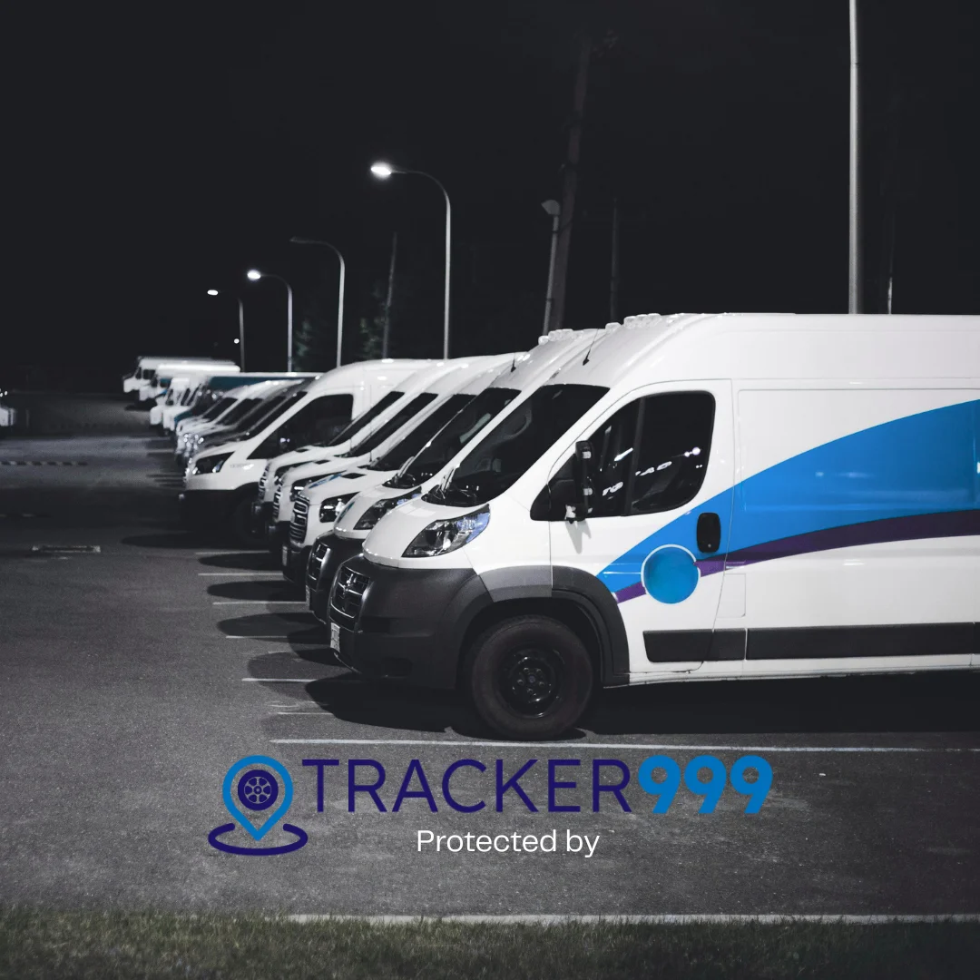 Fleet of white vans parked in a secure depot protected by Tracker999 fleet tracking
